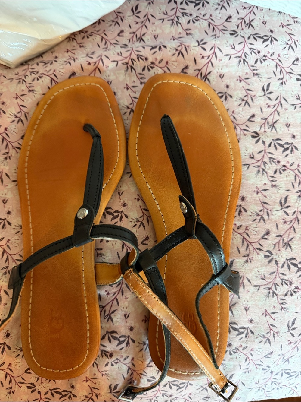 UGG Black and Tan Leather T-Strap Sandals